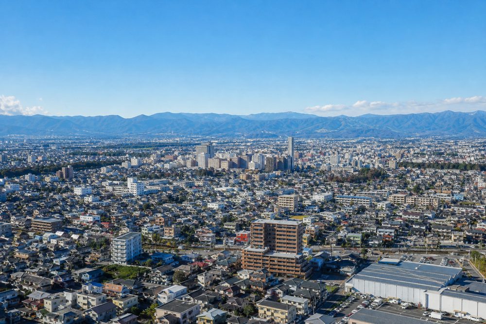 群馬県高崎市の市街地と収益物件が立ち並ぶエリアの俯瞰写真